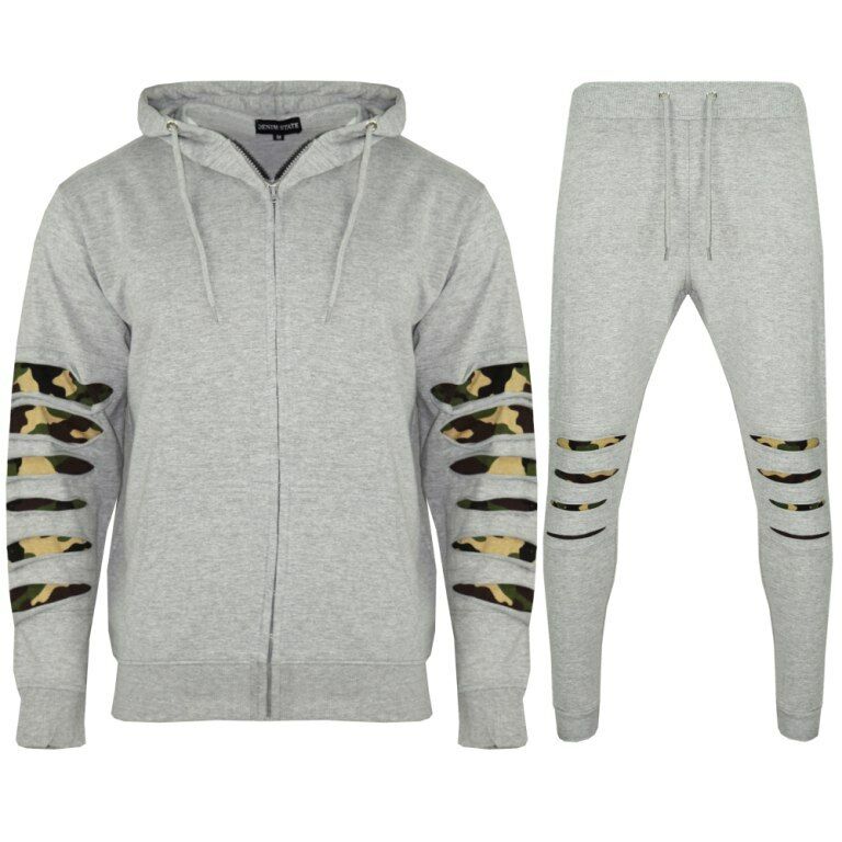 Men's Slim Fit Camo Tracksuit's Available In Silver Grey. Available In Sizes Small, Medium, Large. The Hoodie is front Zip And Has 2 Pockets At The Front. The hood Has A Drawstring Option, Ribbed Elasticated Wrists And Waistband. The Bottoms Also Have An Elasticated Waistband And Drawstring Detail. The Ankle Cuffs Are Also Ribbed And Elasticated.