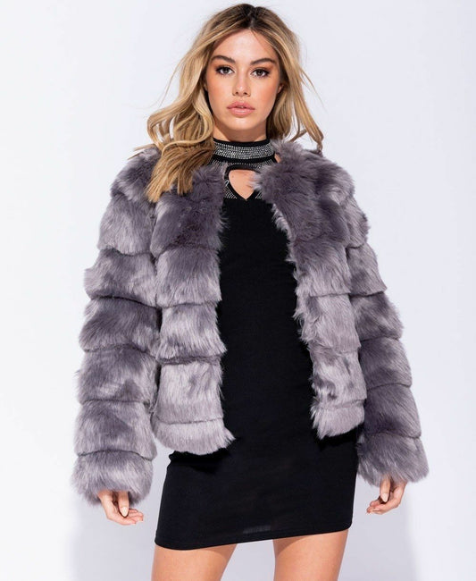 Ladies Edge To Edge Faux Fur Jacket. Available In Sizes 6-14.