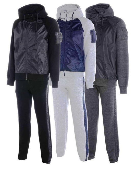 Boys Shell Tracksuits. These Are Available In Black, Charcoal Grey, Silver Grey & Navy. They Have A Pocket On The Sleeve, Elasticated Ribbed Waist Band & Front Zip. The Hood Has A Drawstring Option To Make It Tighter On The Cooler Days. The matching Jogging Bottoms Have Elasticated Waist & Ankles.Available In Ages 7-13.