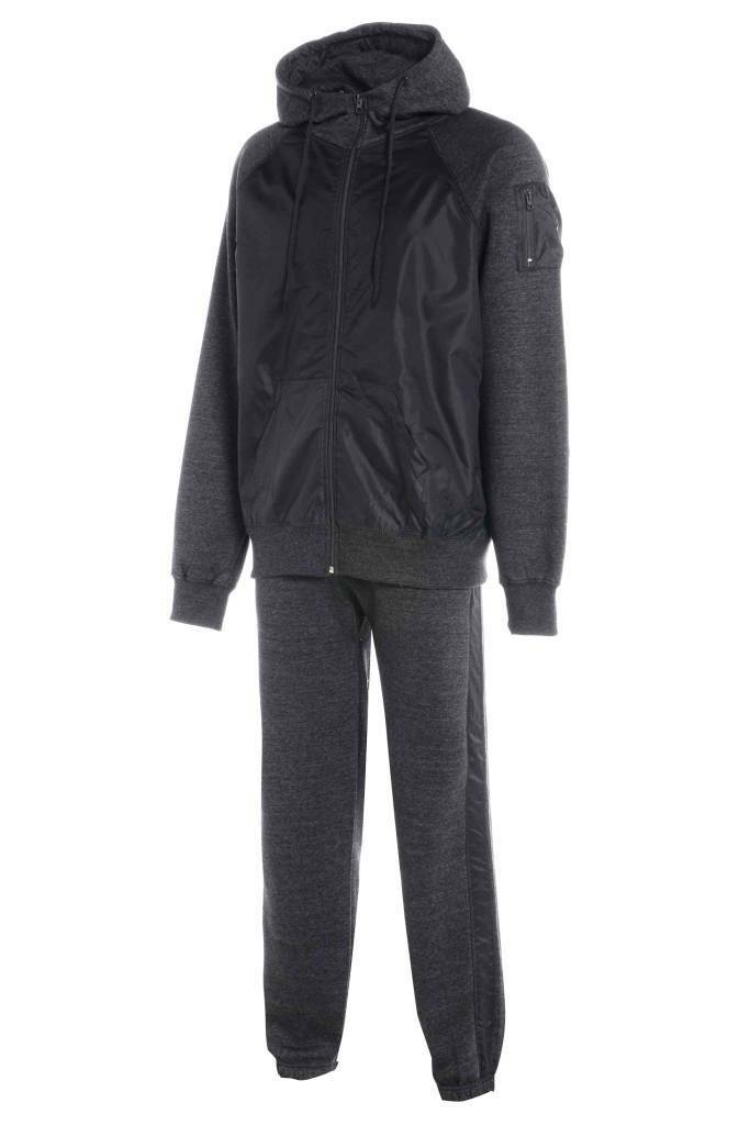 Boys Shell Tracksuits. These Are Available In Charcoal Grey. They Have A Pocket On The Sleeve, Elasticated Ribbed Waist Band & Front Zip. The Hood Has A Drawstring Option To Make It Tighter On The Cooler Days. The matching Jogging Bottoms Have Elasticated Waist & Ankles.Available In Ages 7-13.