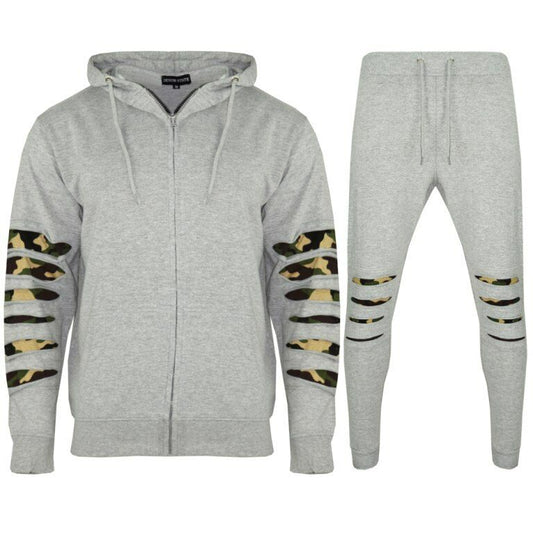 Men's Slim Fit Camo Tracksuit's Available In Silver Grey. Available In Sizes Small, Medium, Large. The Hoodie is front Zip And Has 2 Pockets At The Front. The hood Has A Drawstring Option, Ribbed Elasticated Wrists And Waistband. The Bottoms Also Have An Elasticated Waistband And Drawstring Detail. The Ankle Cuffs Are Also Ribbed And Elasticated.