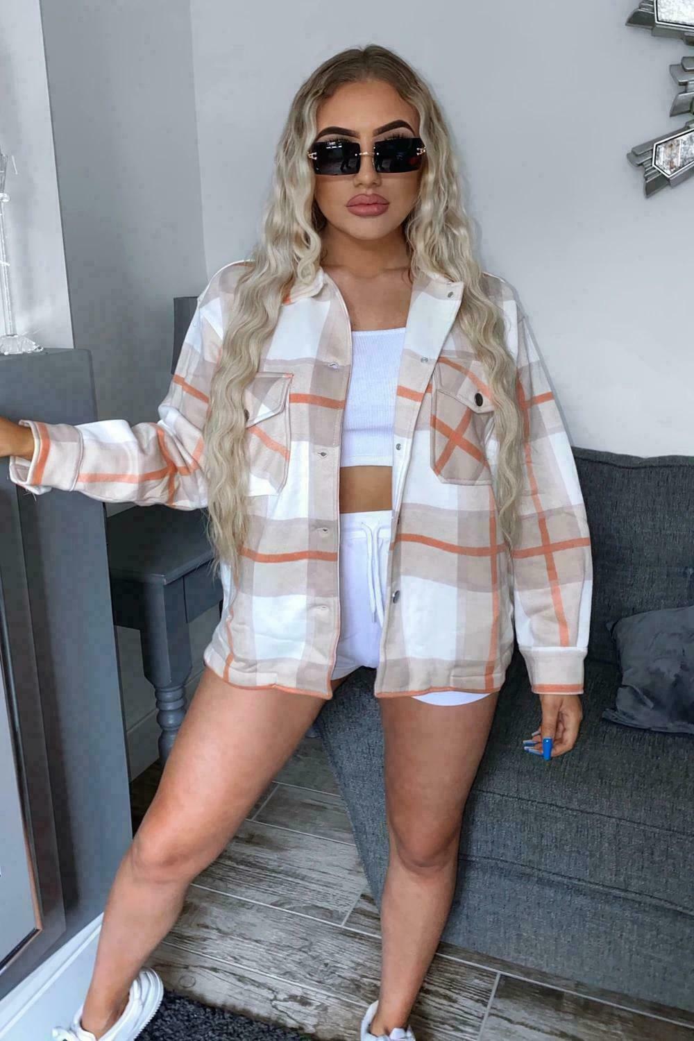 Ladies Oversized Shirt In A Beige Check Design. Available In Sizes 4-8, 8-10, 12-14, 16-18. They Are Perfect To Wear Over A T-Shirt & Jeans As A Jacket.